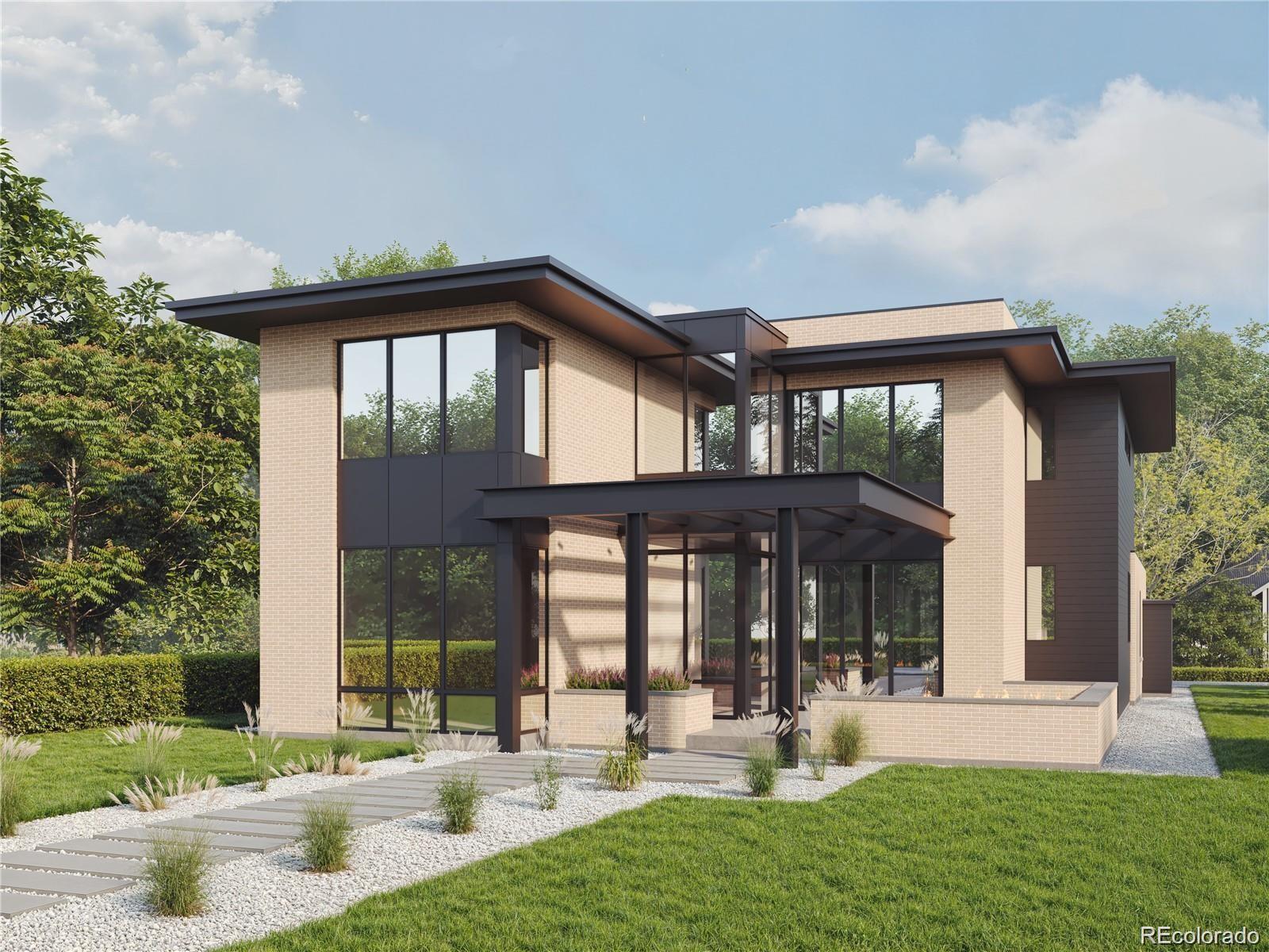 2425 South Jackson Street Denver, CO 80210 - Photo 1 of 3 front view of a house with a yard