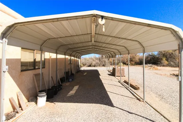 a view of a backyard of the house
