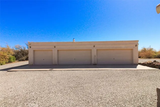 a swimming pool with outdoor seating