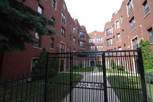 1938 East 74th Street, Unit 3 Chicago, IL 60649 - Photo 2 of 10 a view of buildings from balcony