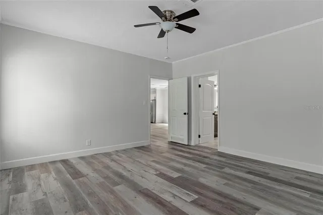 a view of a kitchen with a sink cabinet and a window