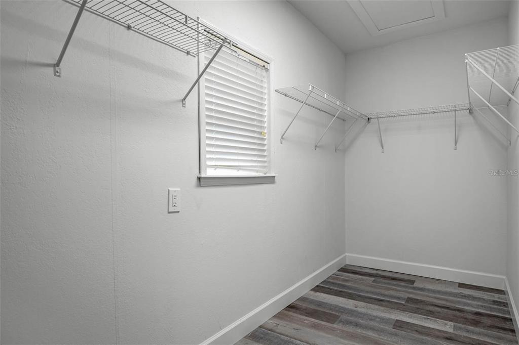 8192 Fort Dade Avenue Brooksville, FL 34601 - Photo 17 of 34 a view of a room with racks on the wall