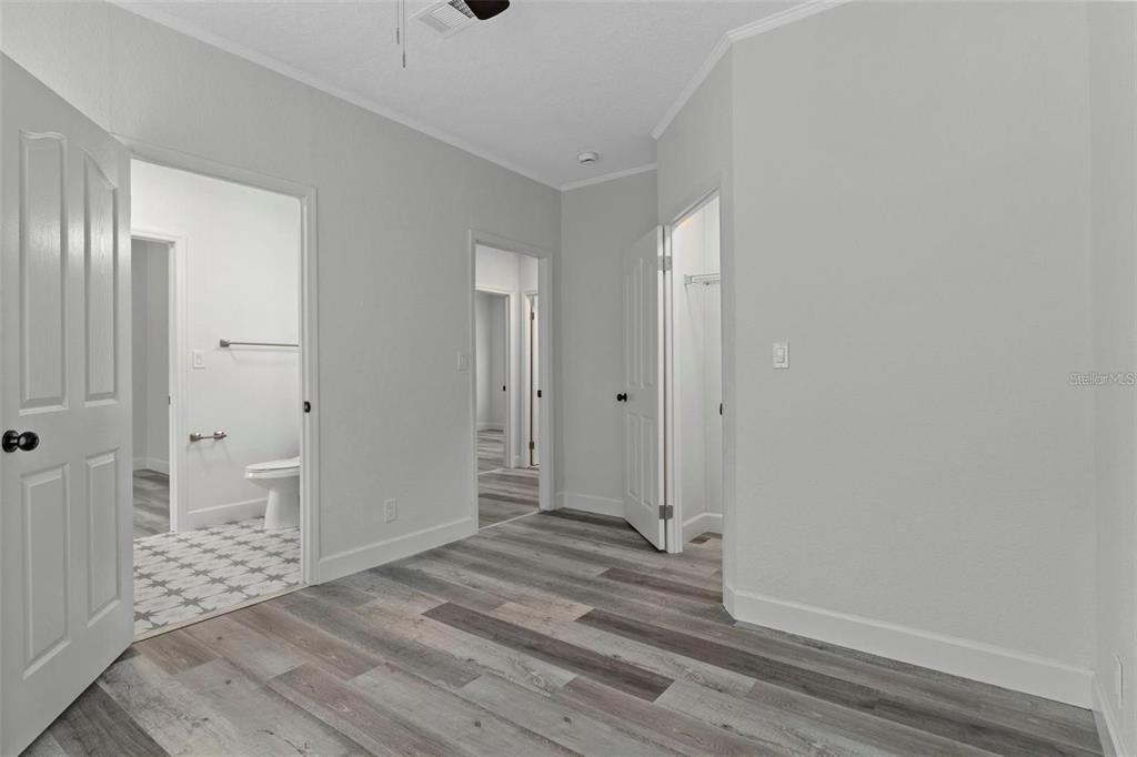 8192 Fort Dade Avenue Brooksville, FL 34601 - Photo 25 of 34 a view of a room with wooden floor and bathroom