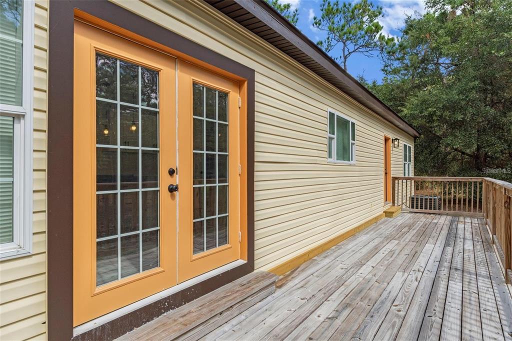 8192 Fort Dade Avenue Brooksville, FL 34601 - Photo 28 of 34 a view of a wooden deck