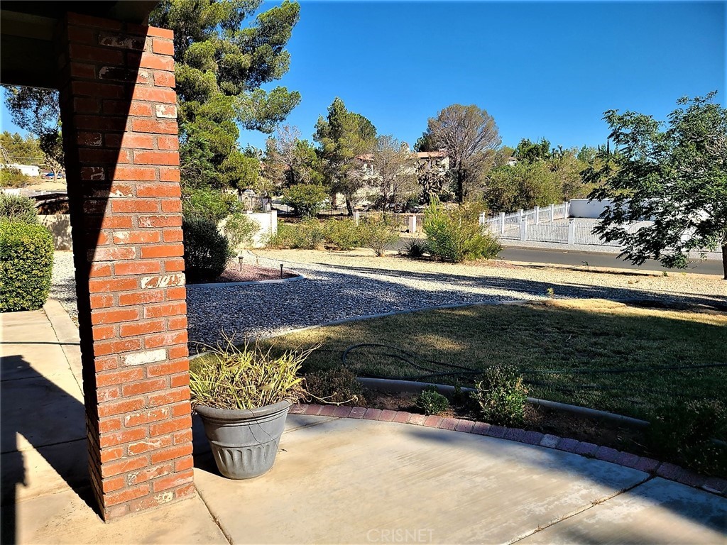 20090 Modoc Road Apple Valley, CA 92308 - Photo 5 of 23 a view of a backyard with sitting area