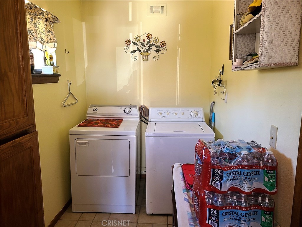 20090 Modoc Road Apple Valley, CA 92308 - Photo 6 of 23 a room with storage and utility