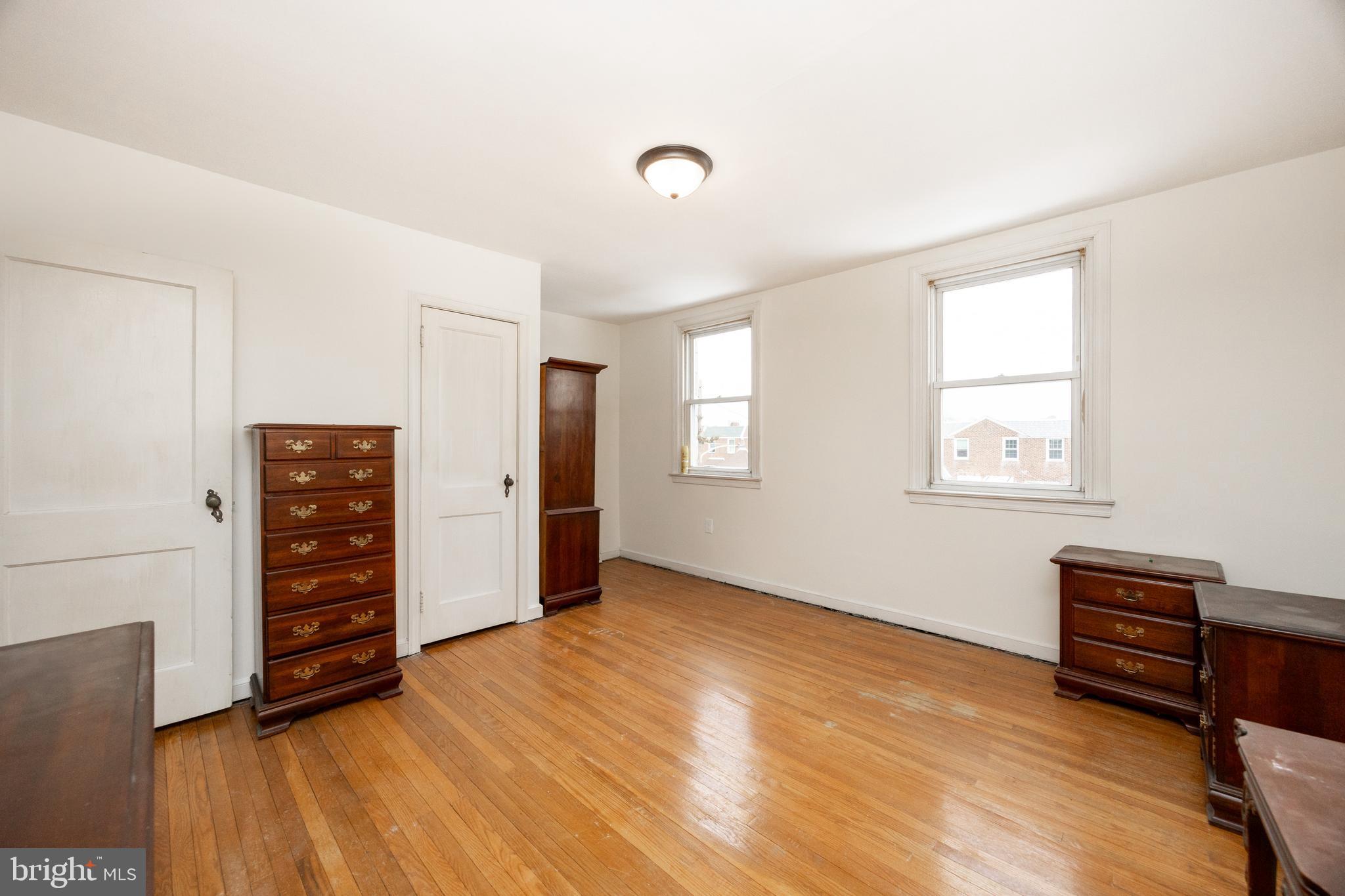 3128 Disston Street Philadelphia, PA 19149 - Photo 15 of 20 an empty room with furniture and wooden floor