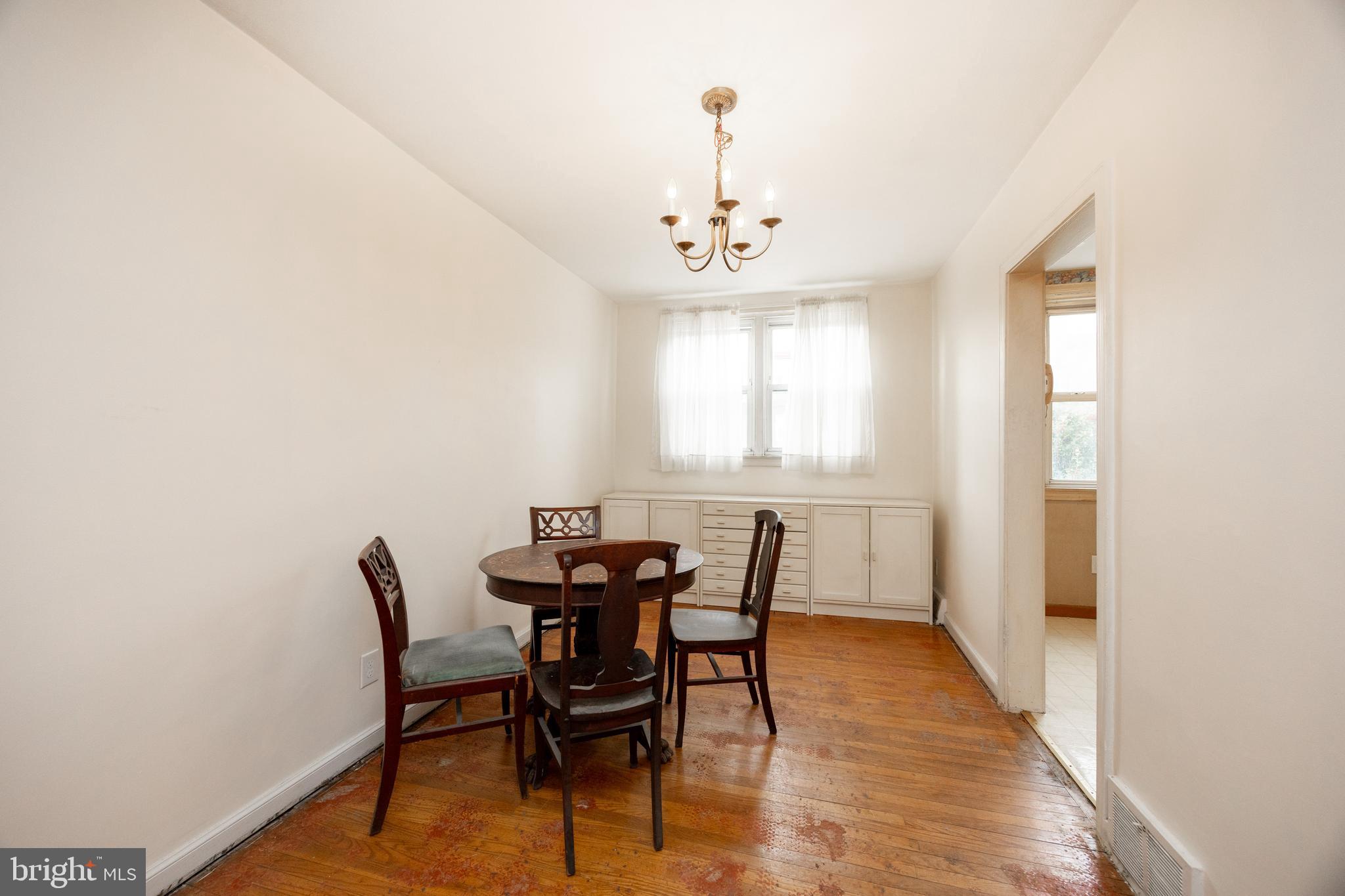 3128 Disston Street Philadelphia, PA 19149 - Photo 8 of 20 a view of a dining room with furniture and window