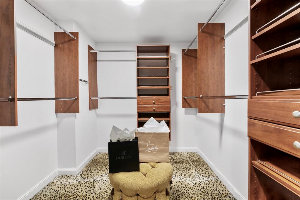 100 South Birch Road, Unit 2403 Fort Lauderdale, FL 33316 - Photo 23 of 26 a hallway with a couch and a stove top oven