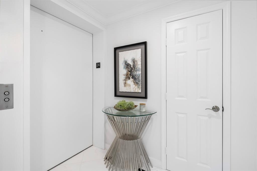 100 South Birch Road, Unit 2403 Fort Lauderdale, FL 33316 - Photo 26 of 26 a view of a room with wall cabinet and window