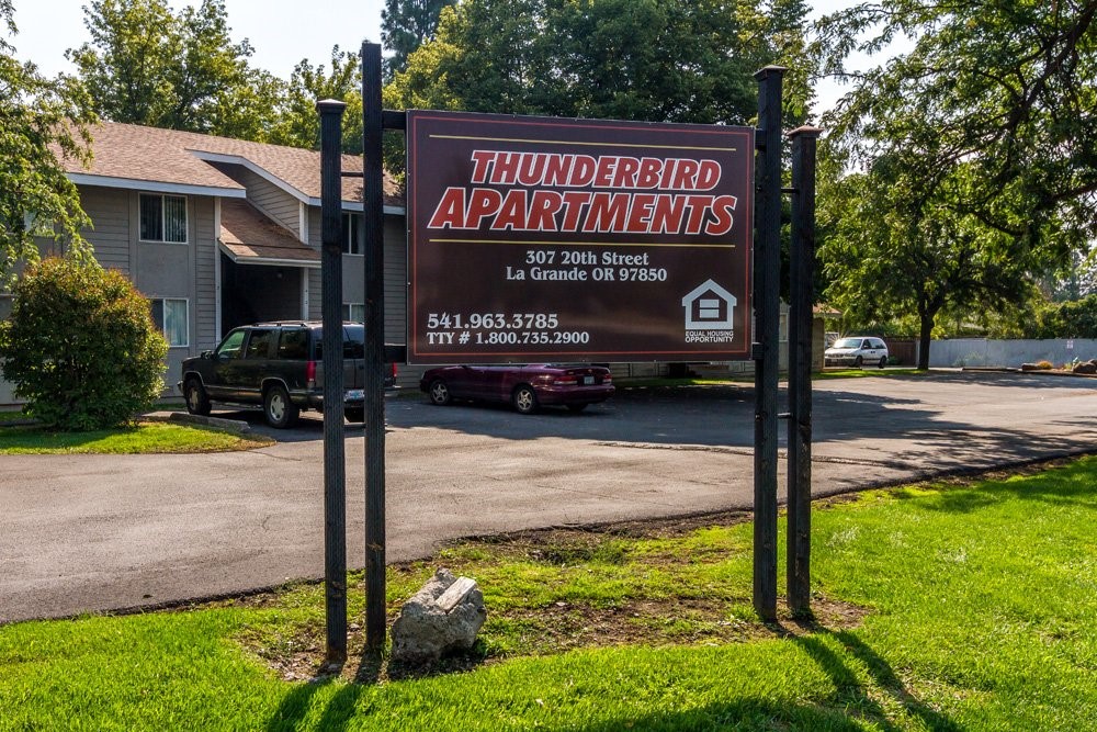 307 20th Street La Grande, OR 97850 - Photo 7 of 9 a view of a street sign under a large tree