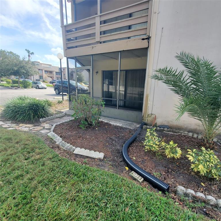 240 Orienta Point Street, Unit 240 Altamonte Springs, FL 32701 - Photo 13 of 20 a view of a porch with a bench