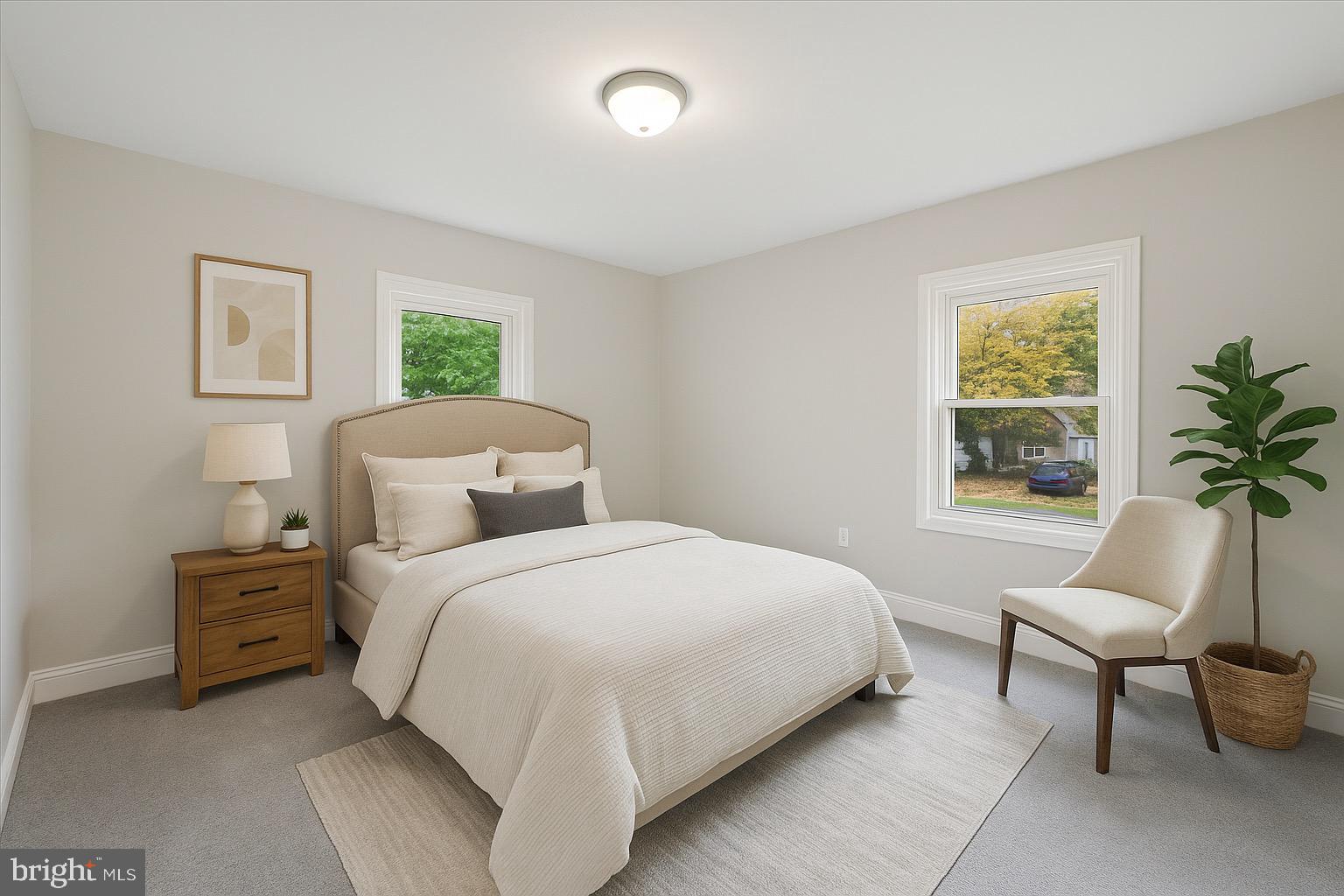 1721 Naamans Creek Road Upper Chichester, PA 19061 - Photo 15 of 33 a bedroom with a bed and a chair