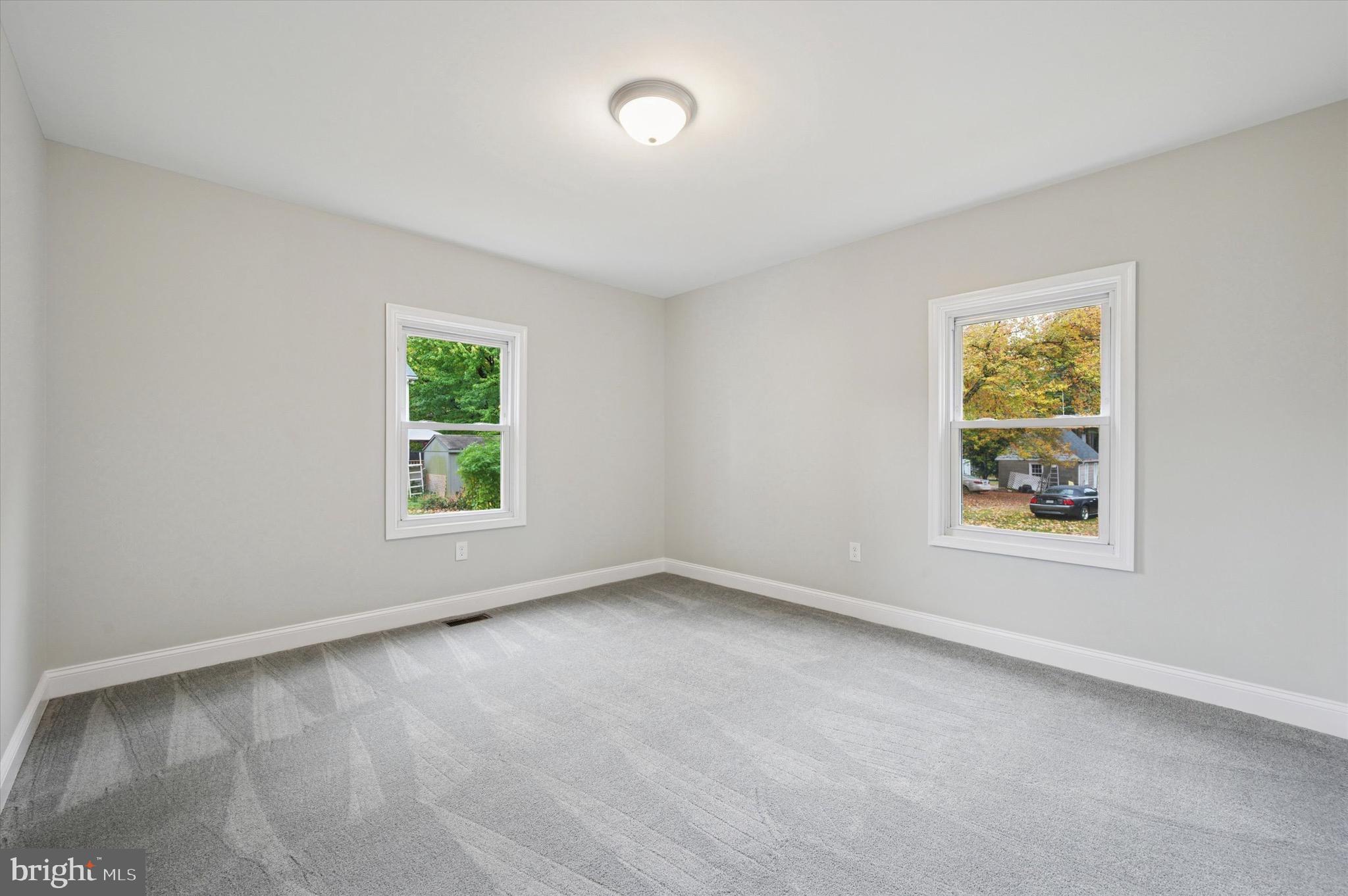 1721 Naamans Creek Road Upper Chichester, PA 19061 - Photo 16 of 33 an empty room with windows