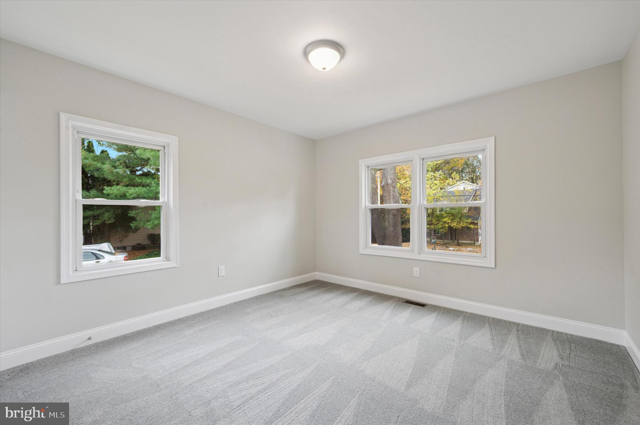 1721 Naamans Creek Road Upper Chichester, PA 19061 - Photo 17 of 33 an empty room with windows