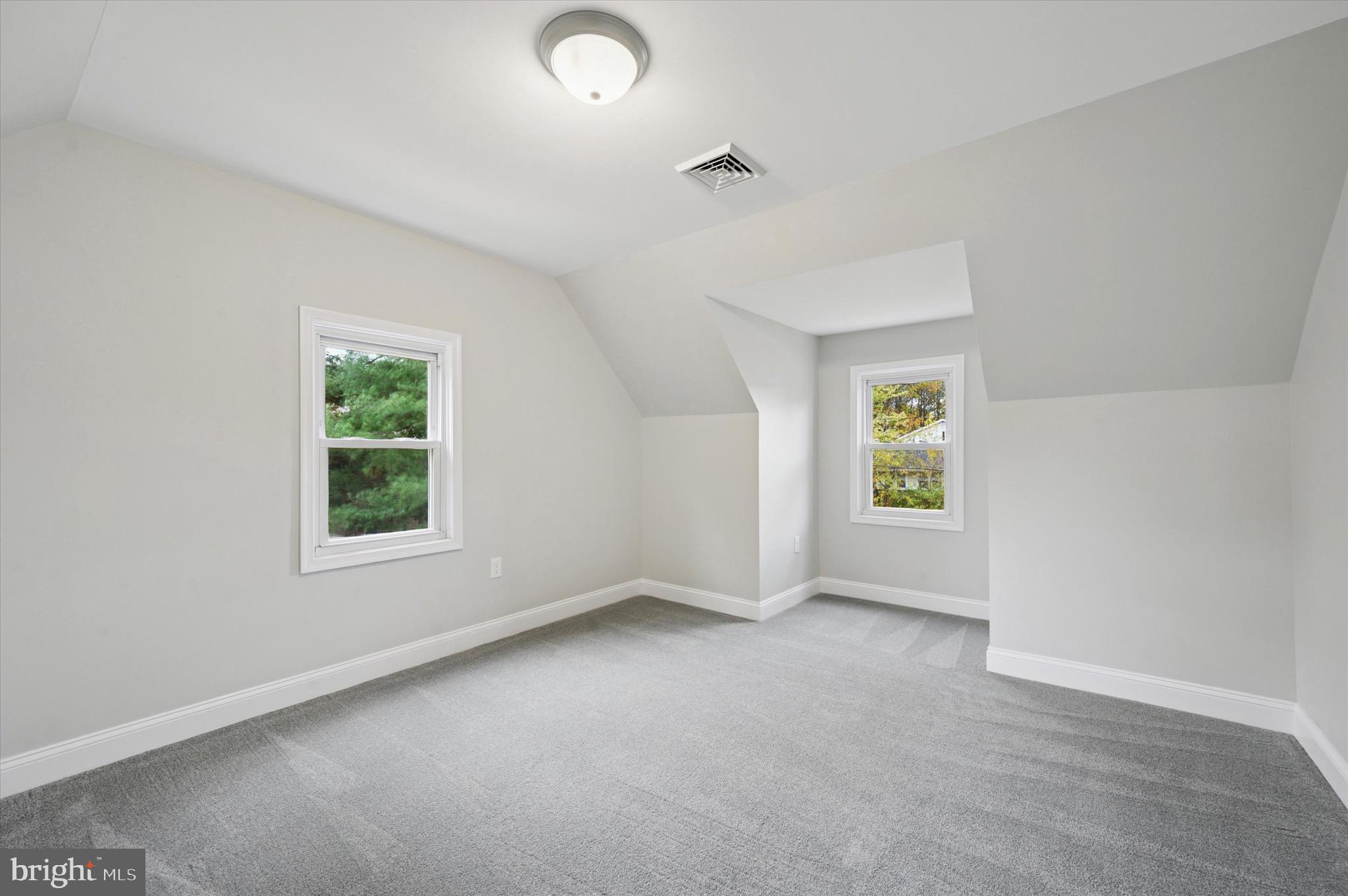 1721 Naamans Creek Road Upper Chichester, PA 19061 - Photo 18 of 33 an empty room with windows
