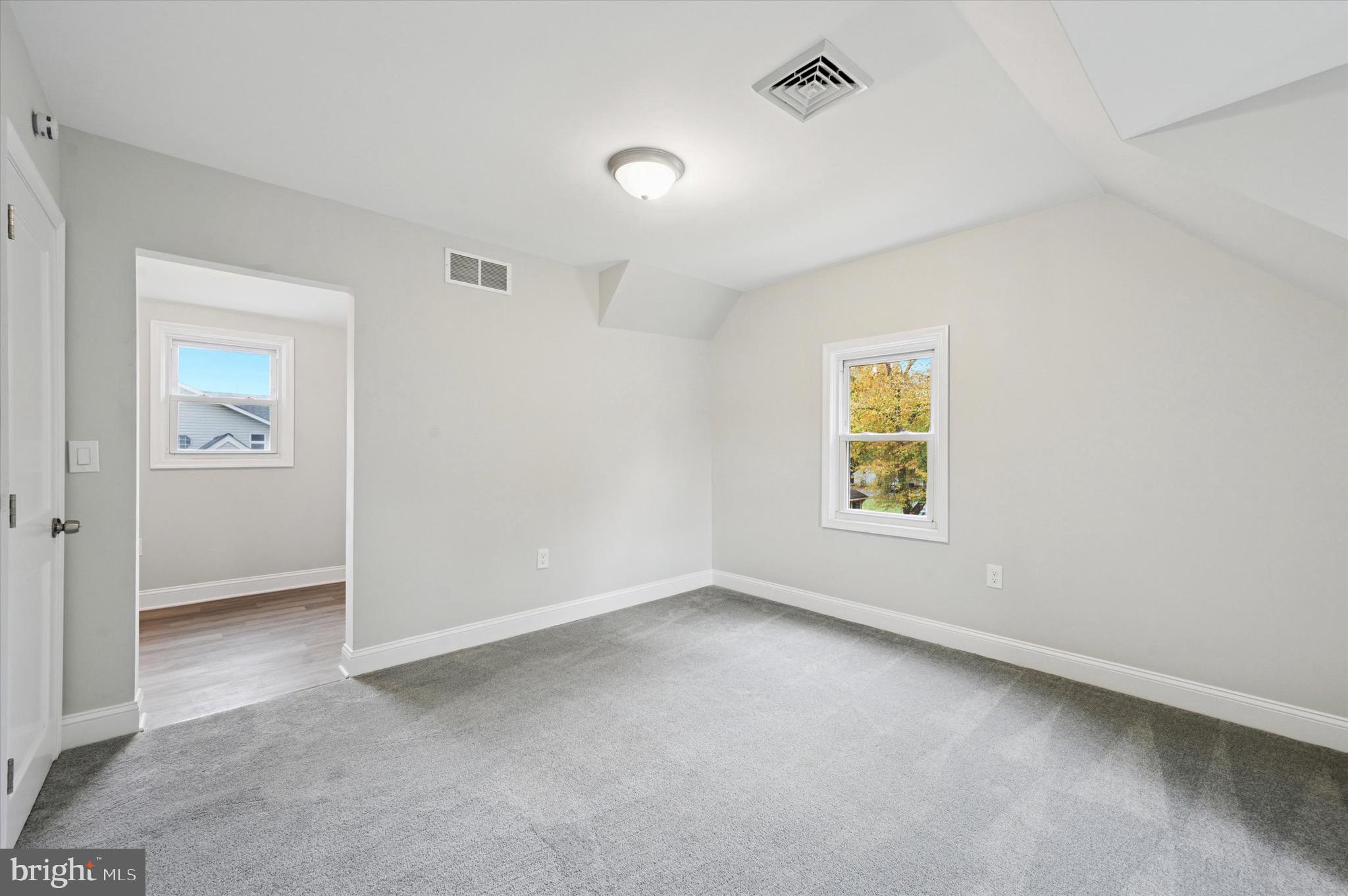 1721 Naamans Creek Road Upper Chichester, PA 19061 - Photo 20 of 33 a view of an empty room with a window