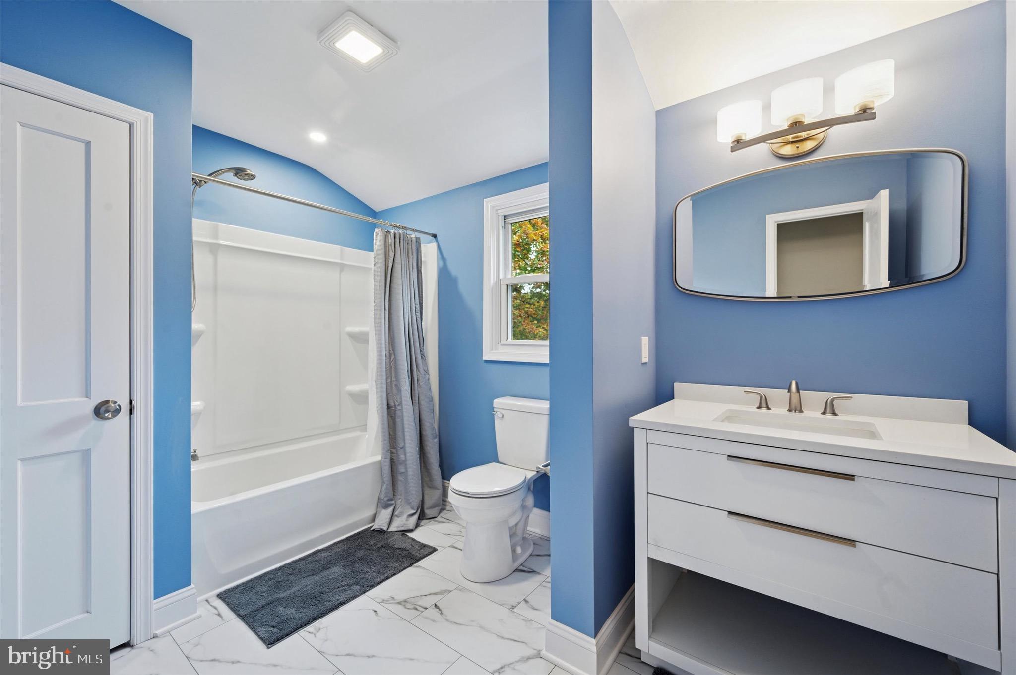 1721 Naamans Creek Road Upper Chichester, PA 19061 - Photo 22 of 33 a bathroom with a sink toilet and shower