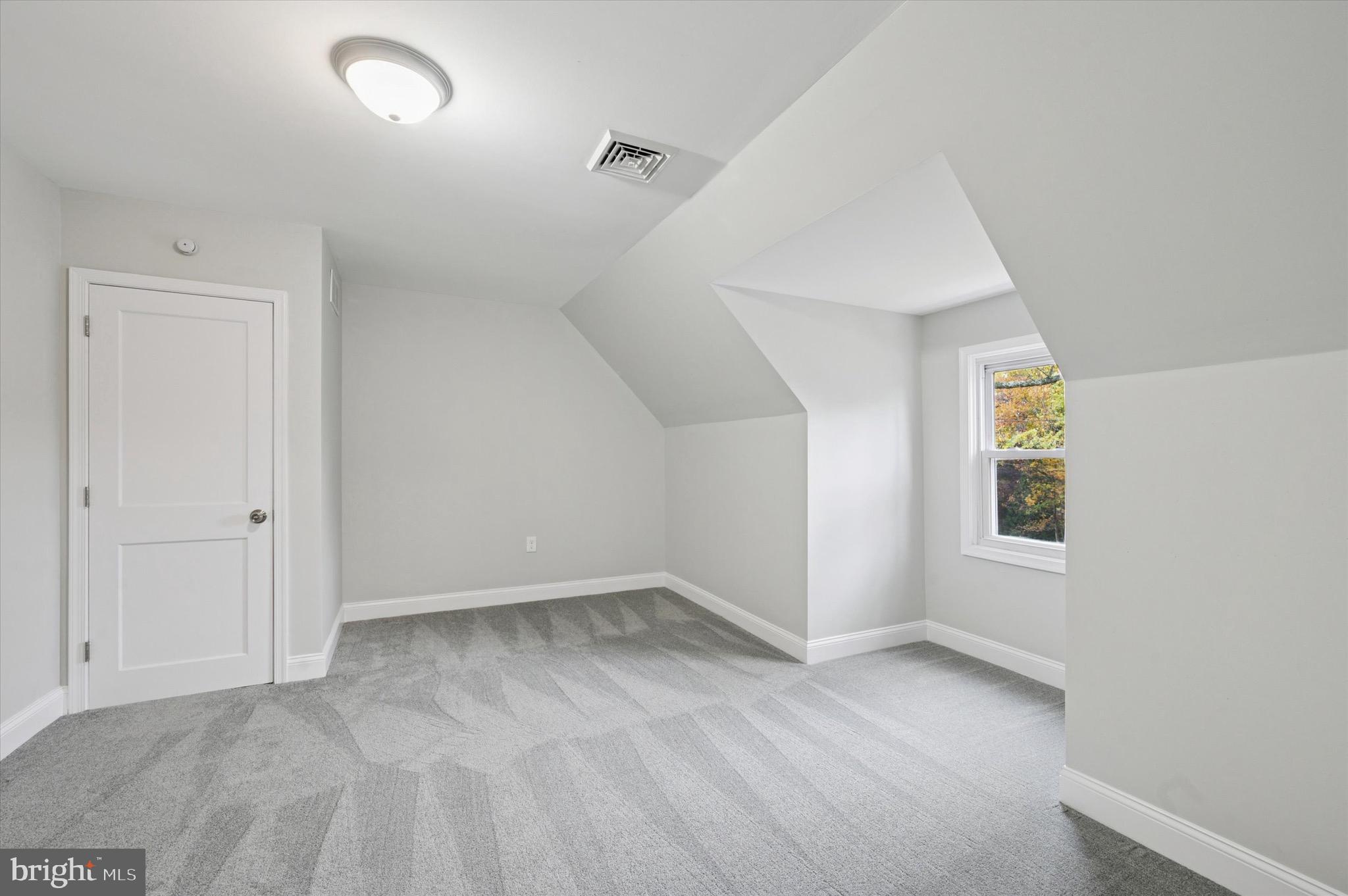 1721 Naamans Creek Road Upper Chichester, PA 19061 - Photo 23 of 33 a view of an empty room with a window