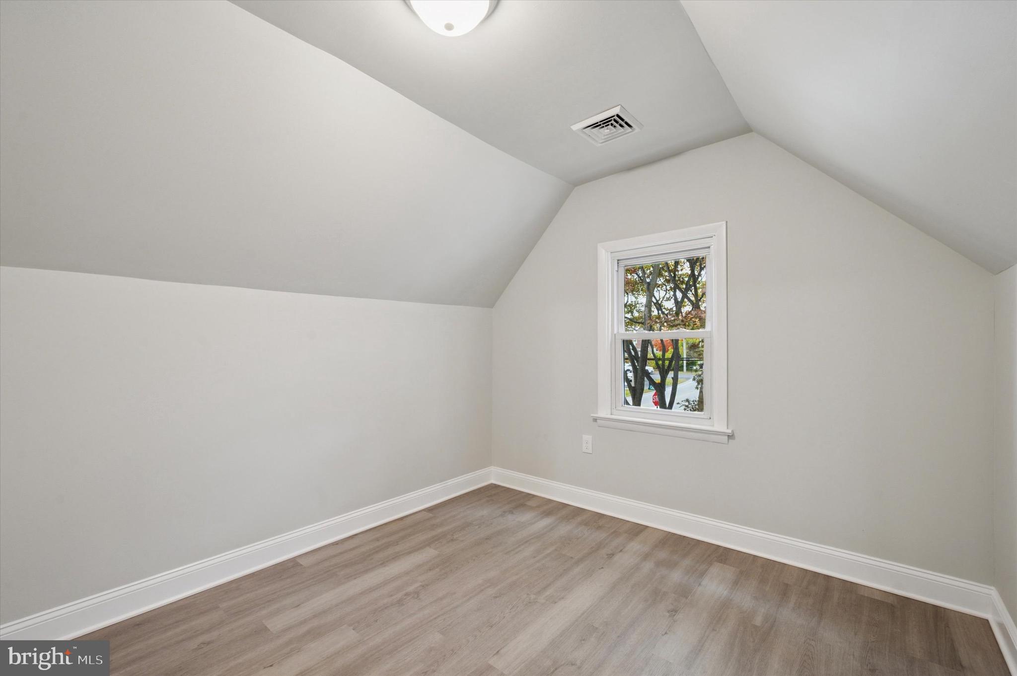 1721 Naamans Creek Road Upper Chichester, PA 19061 - Photo 30 of 33 an empty room with a window