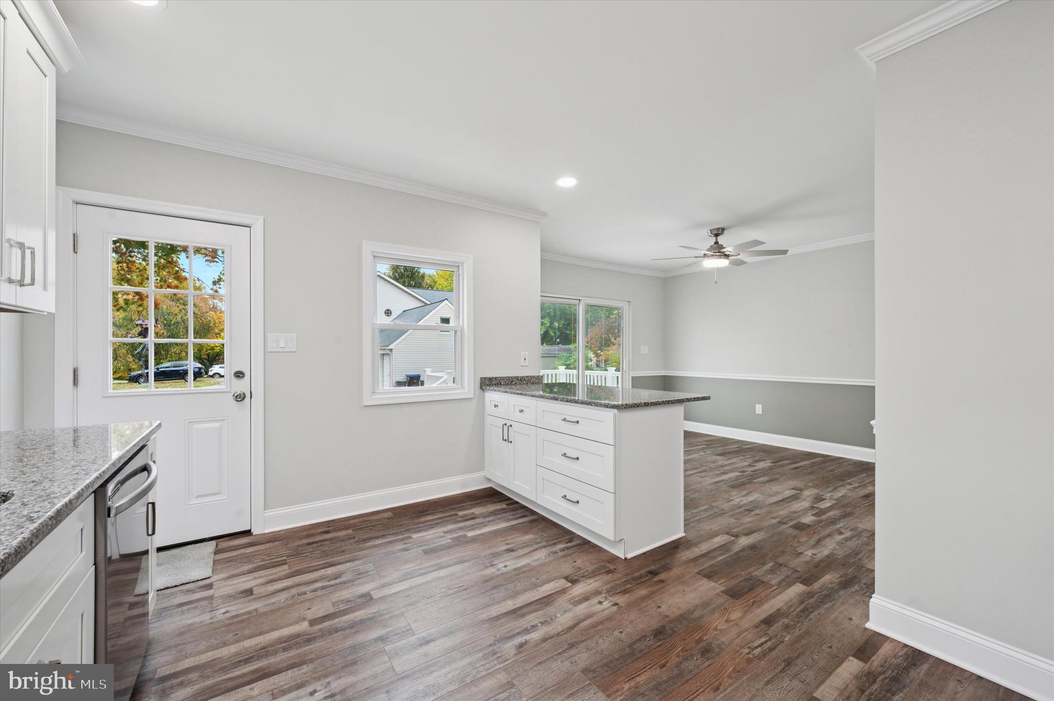 1721 Naamans Creek Road Upper Chichester, PA 19061 - Photo 6 of 33 a room with a wooden floor and window