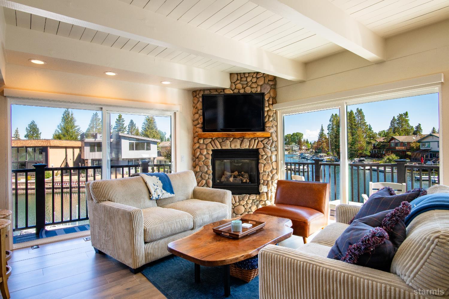 2081 Venice Drive, Unit 280 South Lake Tahoe, CA 96150 - Photo 15 of 37 a living room with furniture and a fireplace