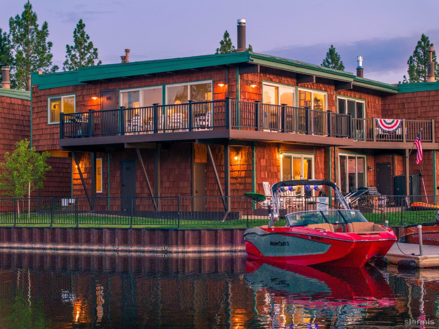 2081 Venice Drive, Unit 280 South Lake Tahoe, CA 96150 - Photo 2 of 37 a front view of a house with balcony and outdoor seating