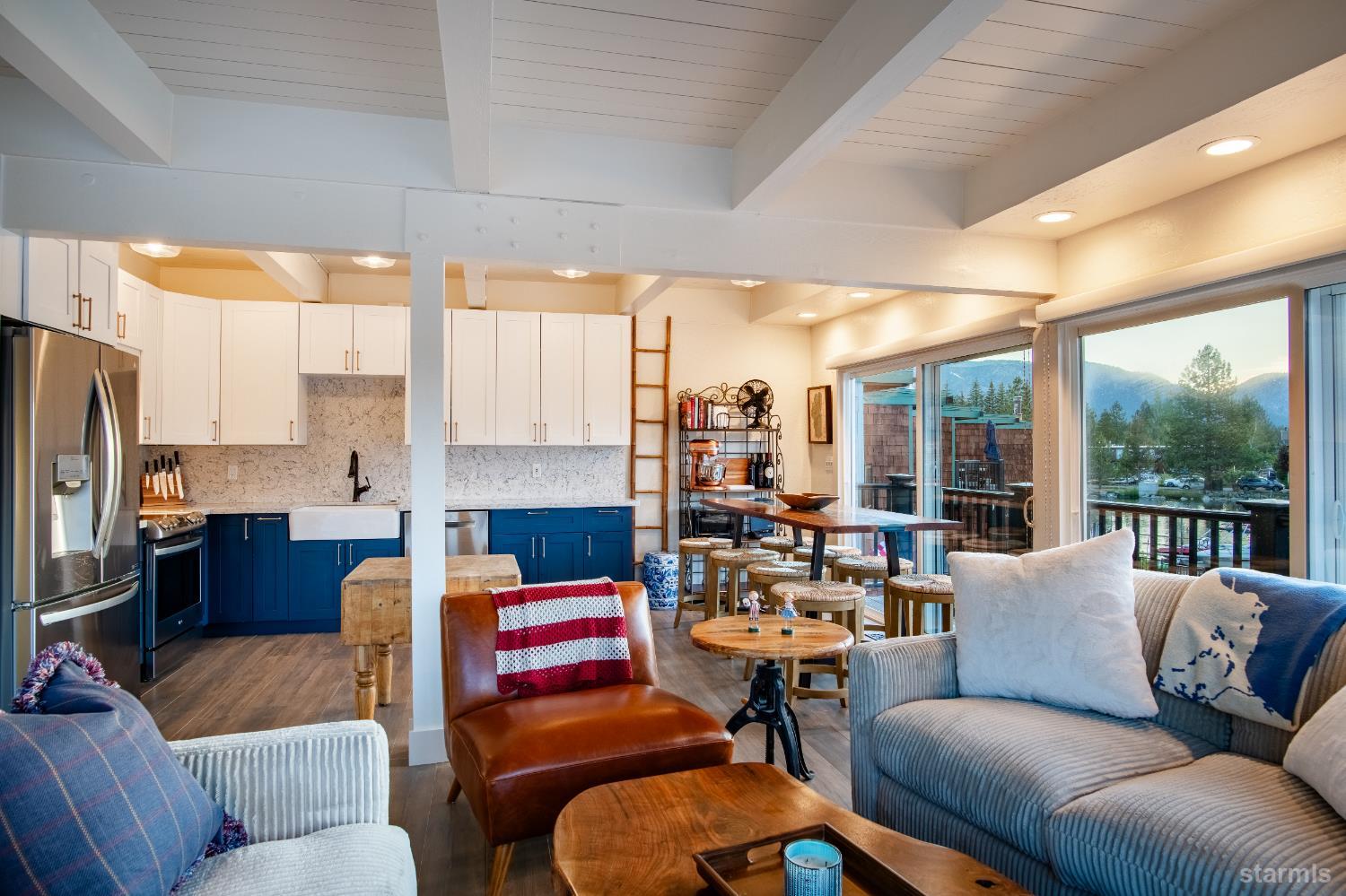 2081 Venice Drive, Unit 280 South Lake Tahoe, CA 96150 - Photo 22 of 37 a living room with furniture fireplace and large window