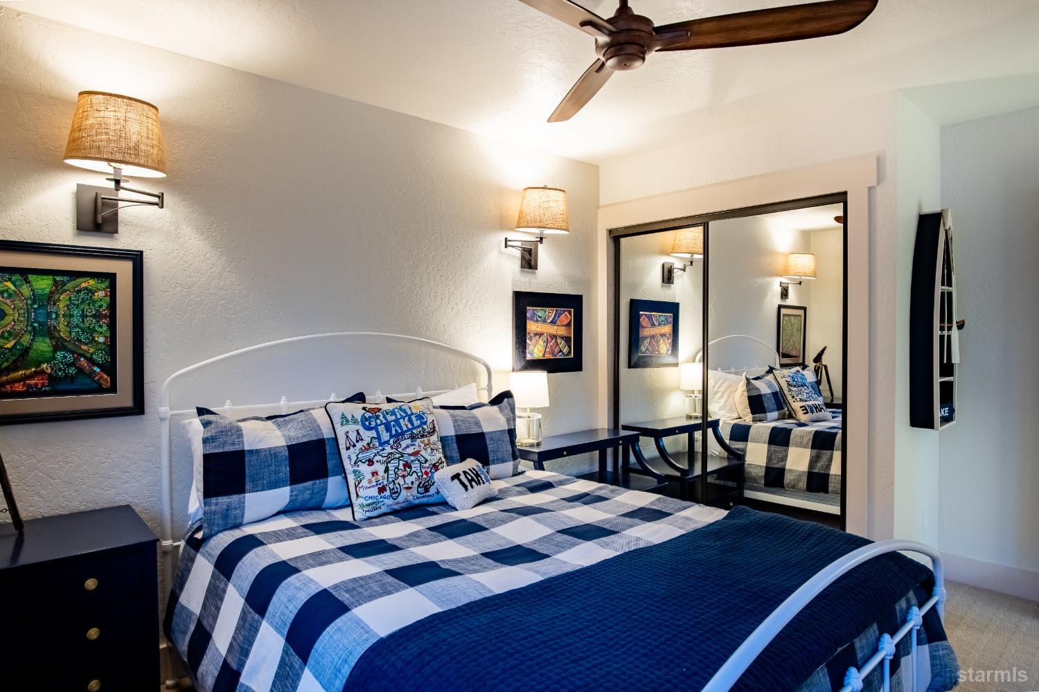 2081 Venice Drive, Unit 280 South Lake Tahoe, CA 96150 - Photo 30 of 37 a bedroom with a bed and a table in it