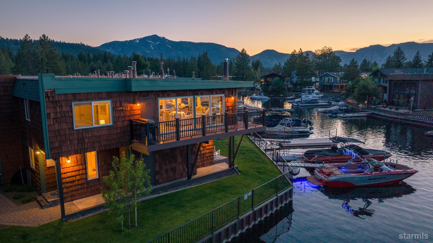 2081 Venice Drive, Unit 280 South Lake Tahoe, CA 96150 - Photo 3 of 37 a backyard of a house with table and chairs