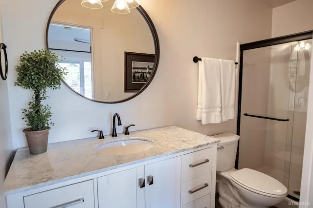 a view of an entryway with wooden floor and stairs