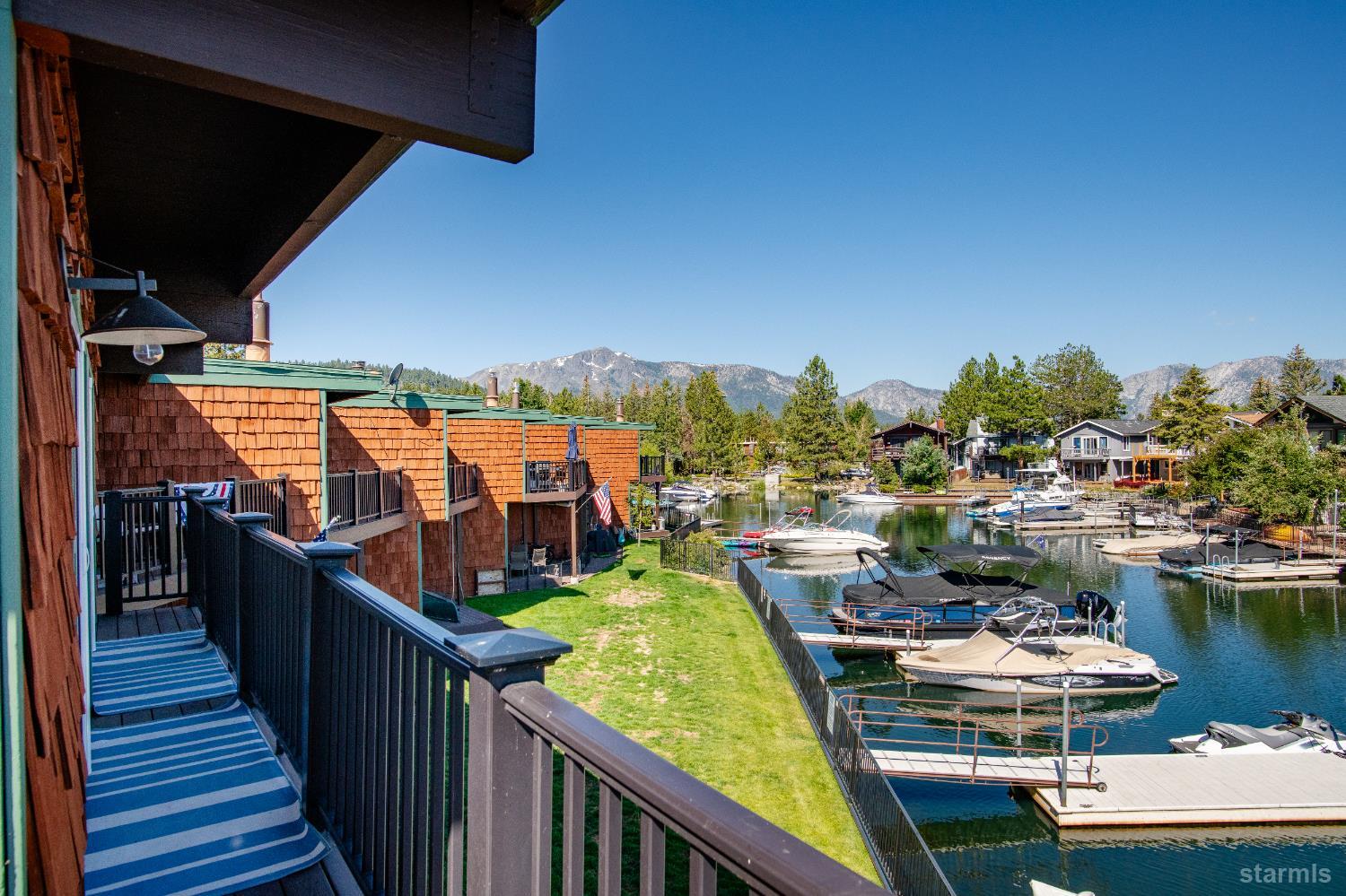 2081 Venice Drive, Unit 280 South Lake Tahoe, CA 96150 - Photo 36 of 37 a view of a lake with couches and city view