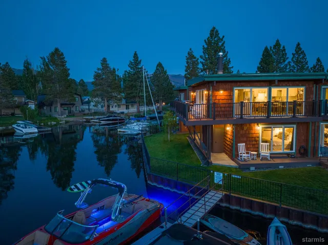 swimming pool view with a seating space