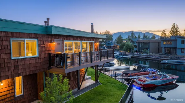 a living room with furniture a pool table and a yard