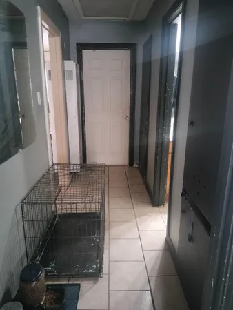 a view of entryway with a door