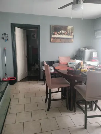 a workspace with furniture and window