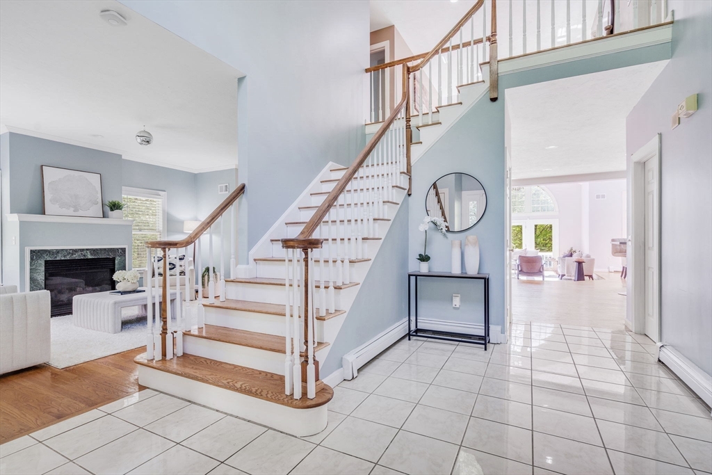 153 Walpole Street Dover, MA 02030 - Photo 15 of 42 a view of entryway and hall with wooden floor