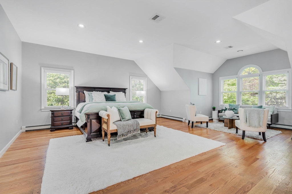 153 Walpole Street Dover, MA 02030 - Photo 17 of 42 a bed room with furniture and a large window