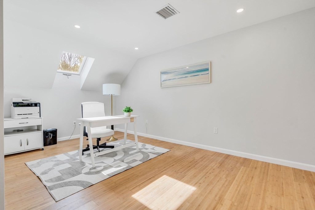 153 Walpole Street Dover, MA 02030 - Photo 27 of 42 a living room with furniture and a table