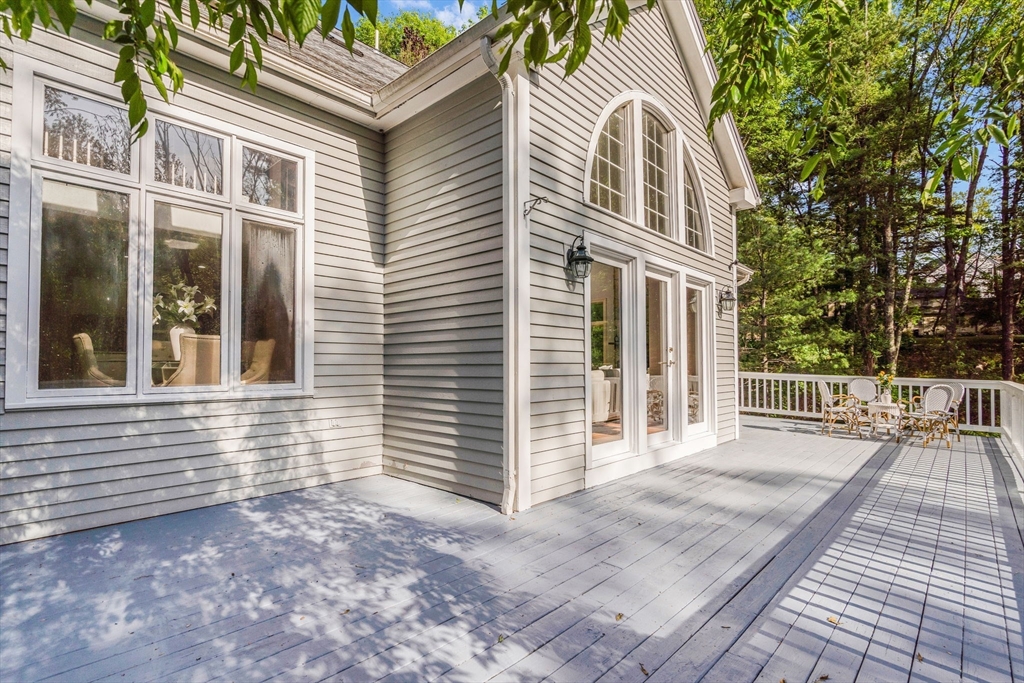 153 Walpole Street Dover, MA 02030 - Photo 33 of 42 a view of a house with a yard