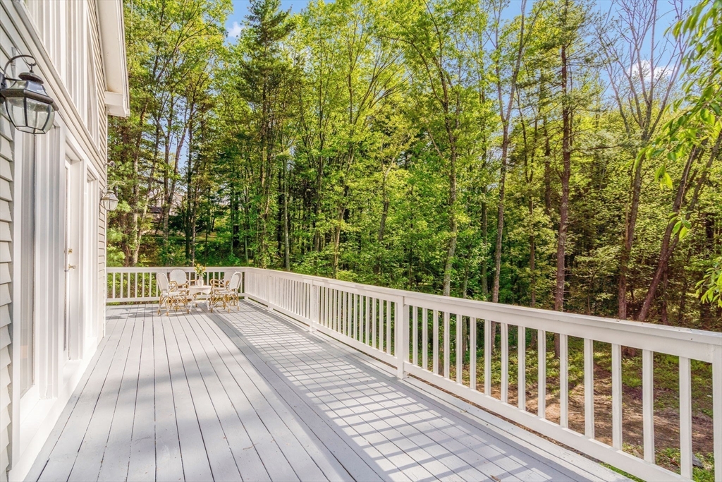 153 Walpole Street Dover, MA 02030 - Photo 34 of 42 a view of balcony with wooden floor