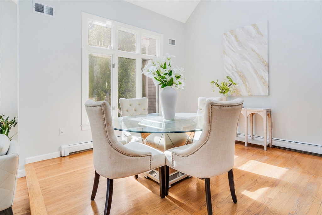 153 Walpole Street Dover, MA 02030 - Photo 5 of 42 a dining room with furniture and wooden floor
