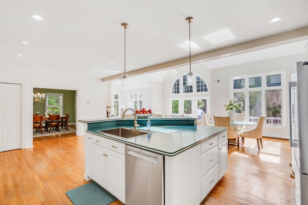 153 Walpole Street Dover, MA 02030 - Photo 8 of 42 a kitchen with stove and center island