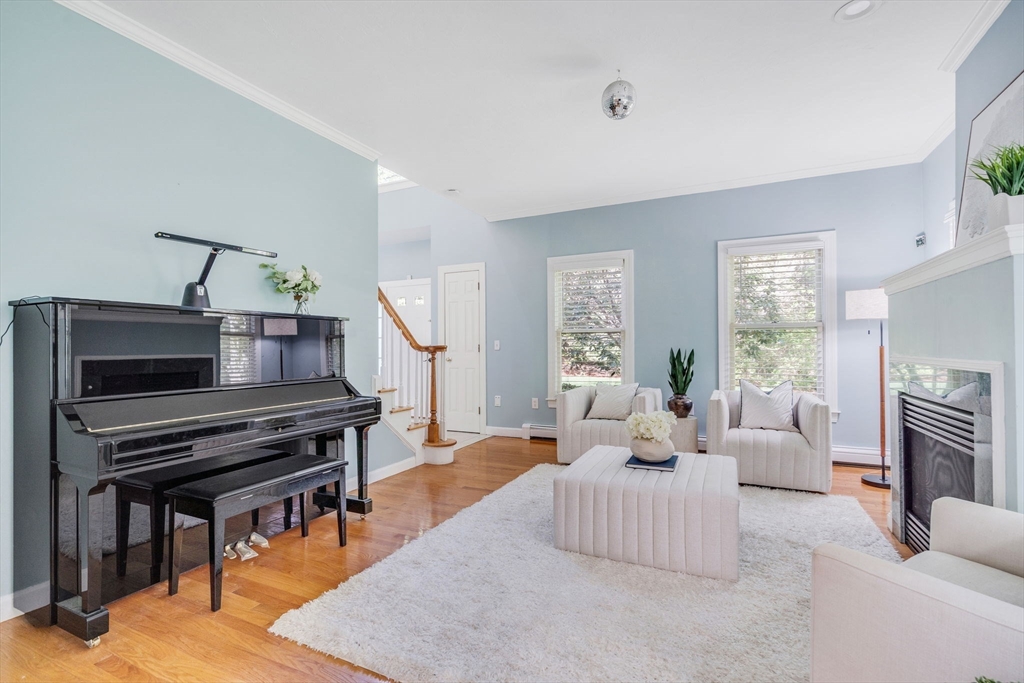153 Walpole Street Dover, MA 02030 - Photo 9 of 42 a living room with furniture and a piano
