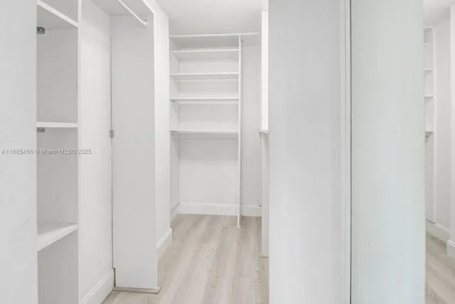 a view of a walk in closet