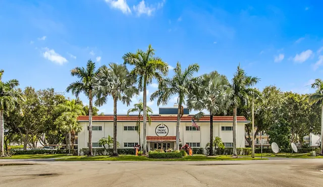 front view of a house with a garden