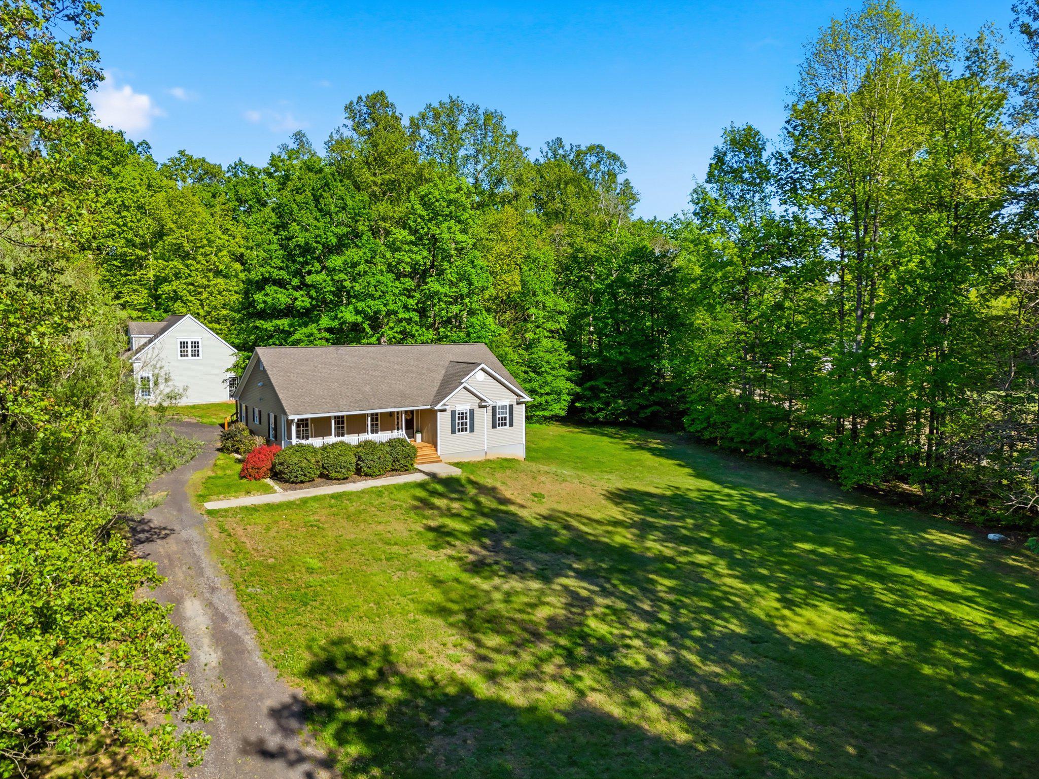 1522 Meander Run Road Locust Dale, VA 22948 - Photo 6 of 72 a view of a house with a big yard potted plants and large tree