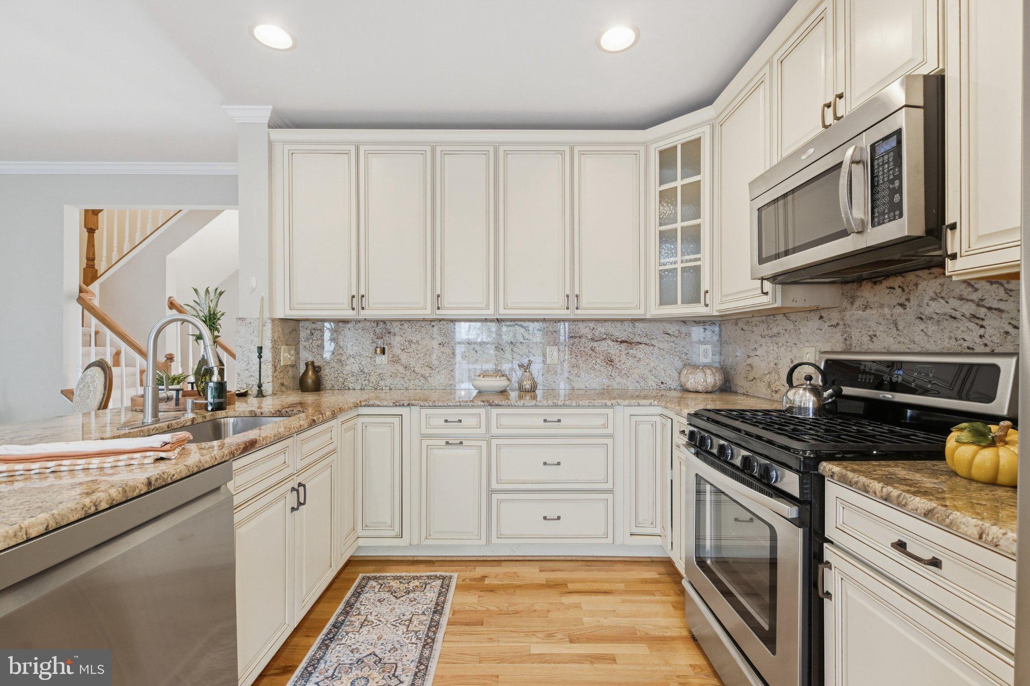 1986 Logan Manor Drive Reston, VA 20190 - Photo 11 of 36 Updated Kitchen with Granite & Stainless Steel