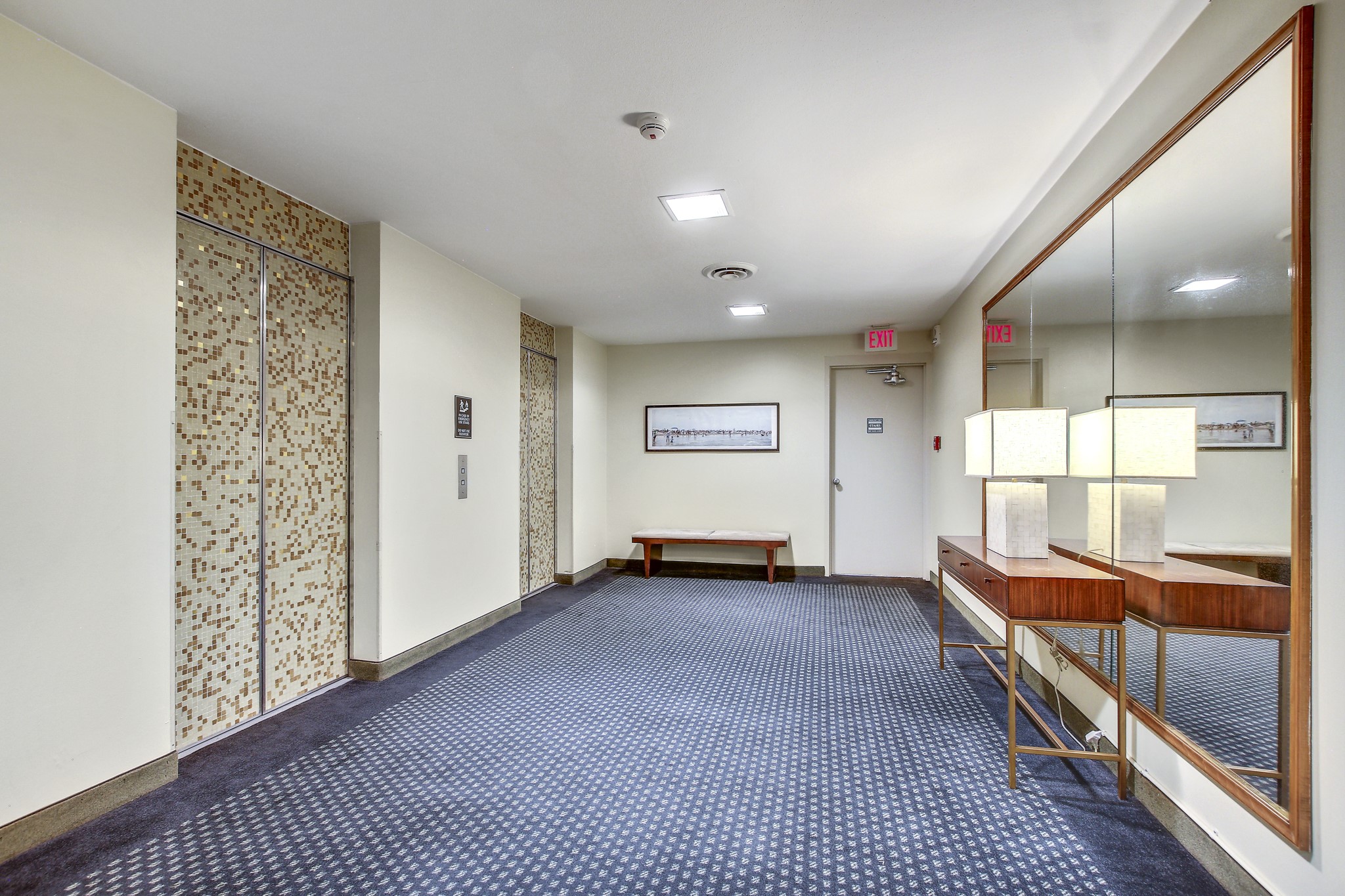 1801 Lavaca Street, Unit 5F Austin, TX 78701 - Photo 24 of 37 an empty room with windows and cabinet