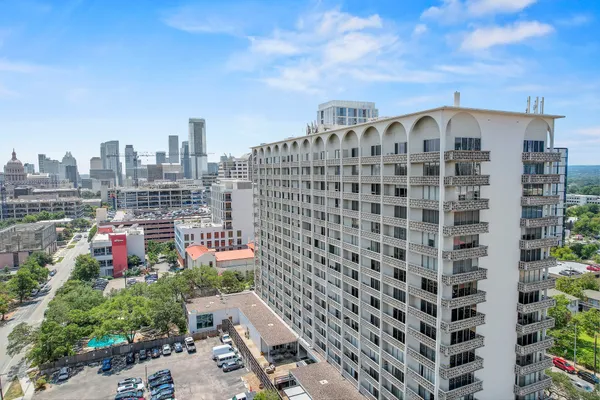 a view of a city with tall buildings